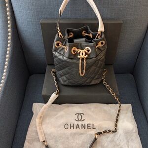 Chanel Black Quilted Drawstring Bucket Bag with Gold Hardware